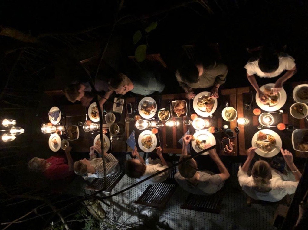 The shared dining table by candle-light